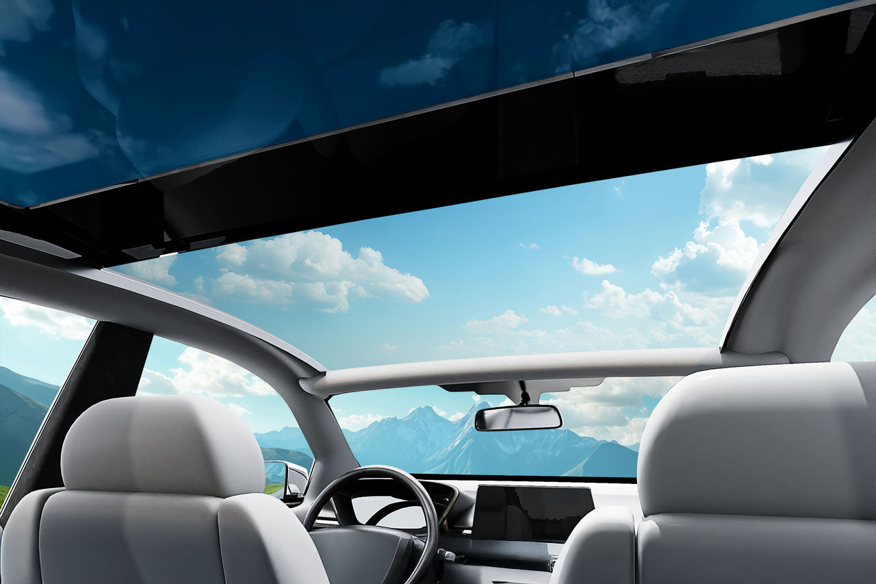 Panoramic glass roof system for passenger cars showcasing a full-width glazed roof with sliding front panel, ideal for products & solutions – roof systems.