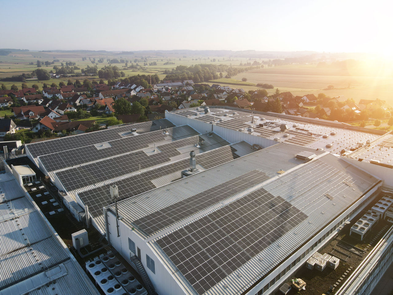 Rooftop solar array at a Webasto facility highlighting sustainability efforts and on-site renewable energy as part of Webasto’s systems partner commitment.