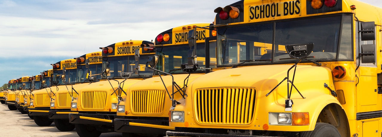 School bus fleet lineup highlighting Webasto as system partner for electrification and thermal management solutions for commercial fleets and school districts.