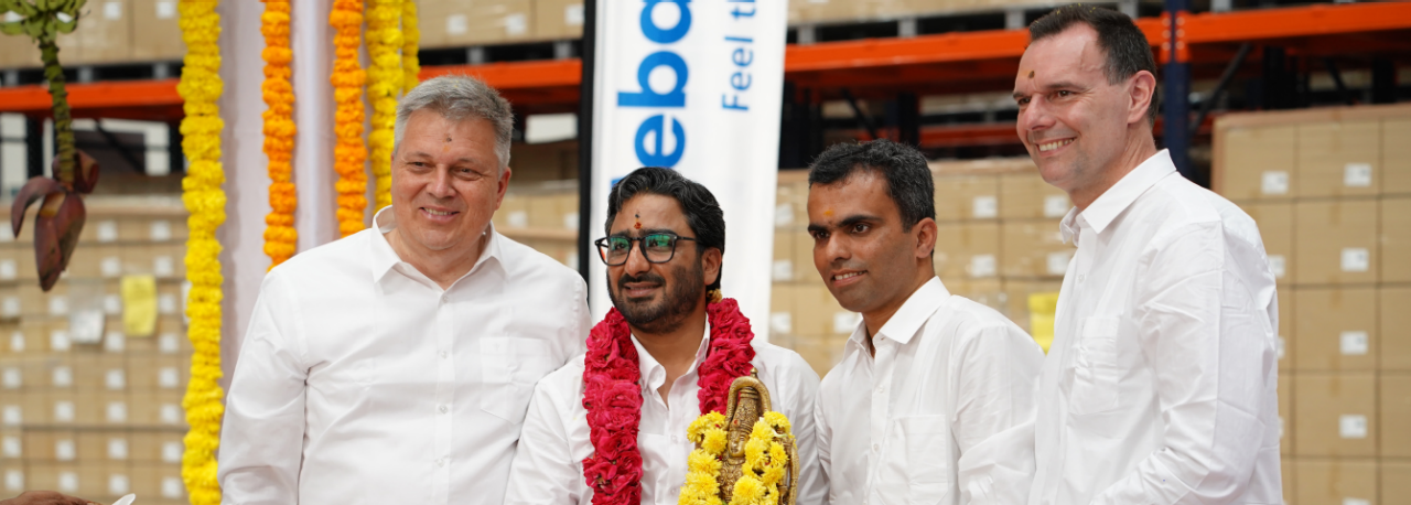 Webasto facility inauguration with local partners and team in a new logistics warehouse, used for newsroom/press release about site opening and system-partner role.