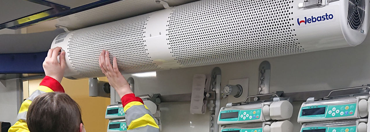 Air unit mounted above infusion pumps, showcasing Webasto solutions for cabin climate control and hygiene in ambulance and emergency medical vehicles.