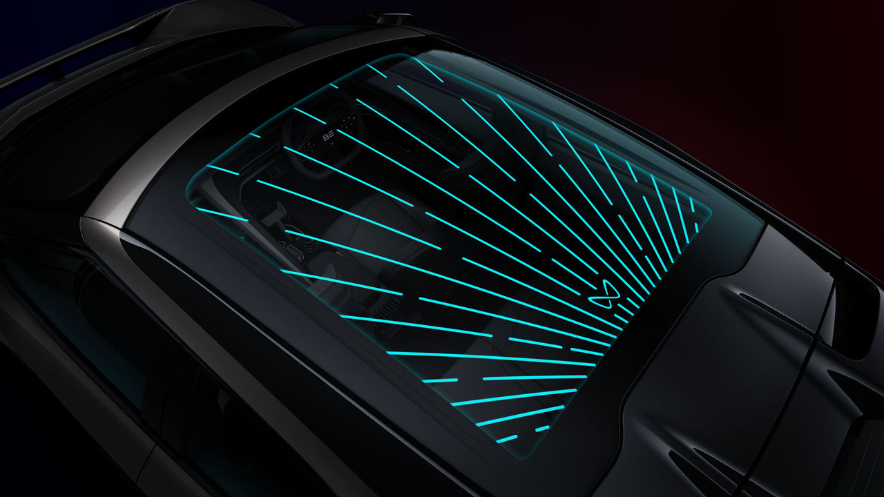 Panoramic glass roof with integrated ambient lighting as hero motif for products & solutions – roof systems, reinforcing Webasto as a system partner.