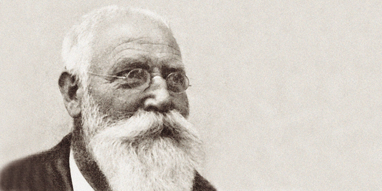 Historic portrait of Webasto founder Wilhelm Baier emphasizing company heritage on The Group — History page, underscoring Webasto as a global systems partner.